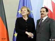 German Chancellor Angela Merkel, left, and the King of Bahrain Hamad bin Isa Al Khalifa shake hands after a meeting at the Chancellery in Berlin on Tuesday, Oct. 28, 2008. 