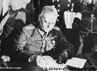 Di Berlin-Karlshort, komandan tempur Wilhelm Keitel menandatangani surat kapitulasi tanpa syarat. Hitler telah tewas, Perang Dunia II di Eropa telah usai, Nazi yang mendominasi Jerman dan Eropa telah digulingkan. Namun setelah itu meletuslah Perang Dingin yang kemudian berlangsung lebih dari 40 tahun.