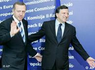 EU Commission President Jose Manuel Barroso, right, ushers Turkey's Prime Minister Recep Tayyip Erdogan, at European Commission headquarters in Brussels