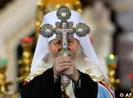 Orthodox priest holding cross