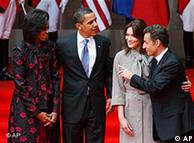 President Barack Obama and first lady Michelle Obama are greeted by France's President Nicolas Sarkozy and wife Carla Bruni-Sarkozy