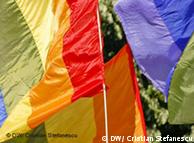 Colourful flags in a gay demostration