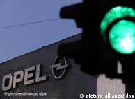 A green light shines beside the Opel logo