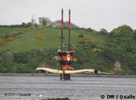 A SeaGen turbine sticking up out of the water in Strengford Lough