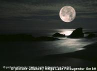 Moon seen at night over the sea