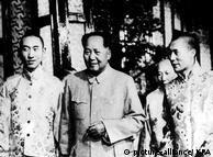 Communist Chinas number one Communist Mao Tse Tung poses with his guests The Panchen Lama and The Dalai Lama during their visit to the red capital in more peaceful days 1956 / Mono Print 