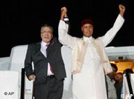 Abdelbaset al-Megrahi welcomed in Tripoli by the son of the Libyan leader Seif al-Islam Gadhafi on August 20, 2009 