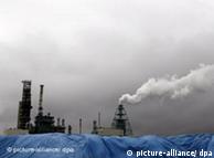 A chimney emits smoke at the Muroran Refinery of Nippon Petroleum Refining Co.