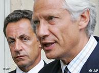 Villepin in background, Sarkozy in front