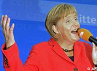 La canciller alemana Angela Merkel sonríe el conocer el resultado de las elecciones en 2009.