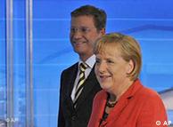 Лідери християнських демократів і лібералів - Анґела Меркель та Ґідо Вестервеллє 