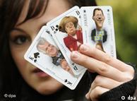 Caricature cards with Merkel, Seehofer and Westerwelle