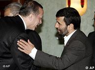 Iranian President Mahmoud Ahmadinejad, right, greets Turkish Prime Minister Recep Tayyip Erdogan