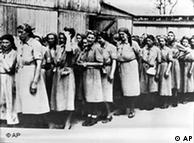 Women prisoners line up for a hard labor assignment at the Auschwitz concentration camp