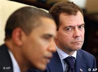 Russian President Dmitry Medvedev, right, looks at U.S. President Barack Obama, 
