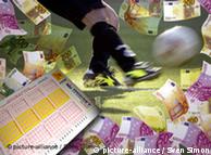 Betting scandal symbolic picture with montage of soccer players and money