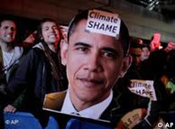 Photo of US presdient Obama held up by protesters