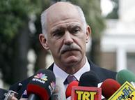 Prime Minister George Papandreou speaks to the press