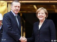 Chancellor Angela Merkel shakes hands with Prime Minister Erdogan