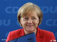 a smiling Chancellor Merkel 
