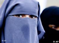 unidentified women are seen wearing a niqab