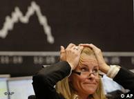 A broker reacts at the stock exchange