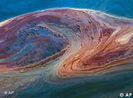Oil swirls in the water