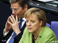 Chancellor Angela Merkel and Foreign Minister Guido Westerwelle during a parliament debate 