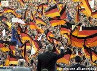 Former German Chancellor Helmut Kohl waving to crowd