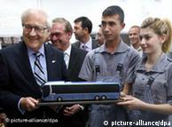 Rainer Bruederle (L), German Federal Minister for Economics and Technology, is received a model bus as a gift from workers of MAN Factory workers during his visit the factory in Ankara, Turkey on 27 May 2010. Foto: Firat Yurdakul dpa +++(c) dpa - Bildfunk+++