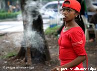 Woman in Jakarta, smoking