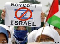 A Muslim student holds up a poster during a rally against Israel's deadly commando raid on ships taking humanitarian aid to the blockaded Gaza Strip, in Jakarta, Indonesia, Tuesday, June 1, 2010.