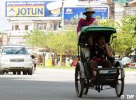 A cyclo driver pedals one of the shrinking number of Cambodians who use this traditional form of getting around Phnom Penh.