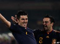 David Villa and Xavi celebrate Villa's opening goal against Chile in Group H of the 2010 FIFA World Cup