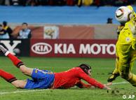 Spain's Sergio Ramos, left, tries to score a goal past Germany goalkeeper Manuel Neuer, right.