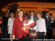 Angela Merkel walks away from her plane