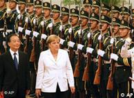Angela Merkel inspects the guard of honor in Beijing