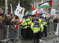 Irish police hold back demonstrators in Dublin