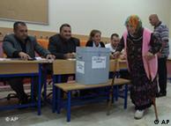 A Turkish woman leaves a polling station after casting her vote in a referendum on changes to the constitution