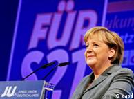 Chancellor Angela Merkel speaks to supporters