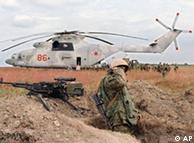 Russian troops move boarding a Mi-26 helicopter