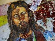 A blood-spattered poster of Jesus Christ 