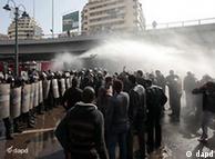 Police and demonstrators in Cairo