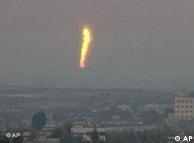 a fire is seen after an explosion went off at a gas terminal in Egypt's northern Sinai Peninsula on Saturday Feb. 5, 2011