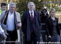 WikiLeaks founder Julian Assange (C) accompanied by Jennifer Robinson (R), a member of his legal team, and Kristinn Hrafnsson (L) a spokesman for WikiLeaks