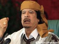 Libyan leader Moammar Gadhafi gestures during a speech 