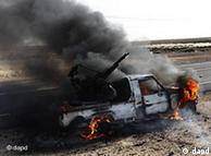 Libyan rebels battle Gadhafi loyalists in Brega 