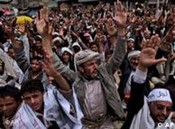 Protestors gesturing and chanting demanding the resignation of Yemen's president 