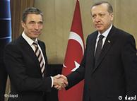 Secretary General of NATO Anders Fogh Rasmussen, left, is welcomed by Turkey's Prime Minister Recep Tayyip Erdogan in Ankara, Turkey, Monday, April 4, 2011.  NATO Secretary-General Fogh Rasmussen holds talks with Erdogan and Foreign Minister Ahmet Davutoglu and other government officials after NATO took sole control of air military operations over Libya.  The U.S. military will pull its warplanes from front-line missions Monday and shift to a support role in Libyan operations, a NATO official said. (AP Photo/Umit Bektas, Pool)